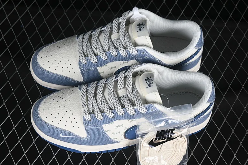 All categories Nk SB Dunk Series Nk SB Dunk Low High-end customized low-top sneakers Nike SB Dunk Low Stusi co-branded Aqua blue denim Anniversary high-end customized low-top casual sneakers JJ2508-562